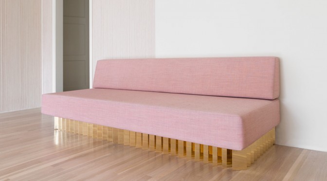 Pink and brass sofa