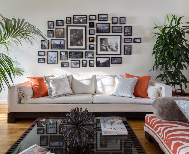 grey couch with pillows