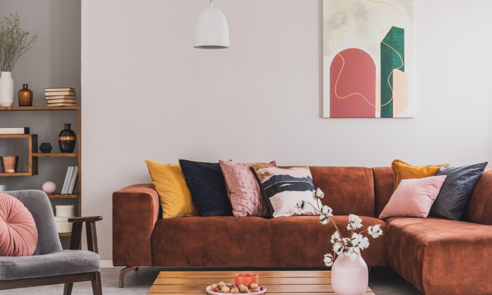 Cozy, brown corner sofa with decorative cushions