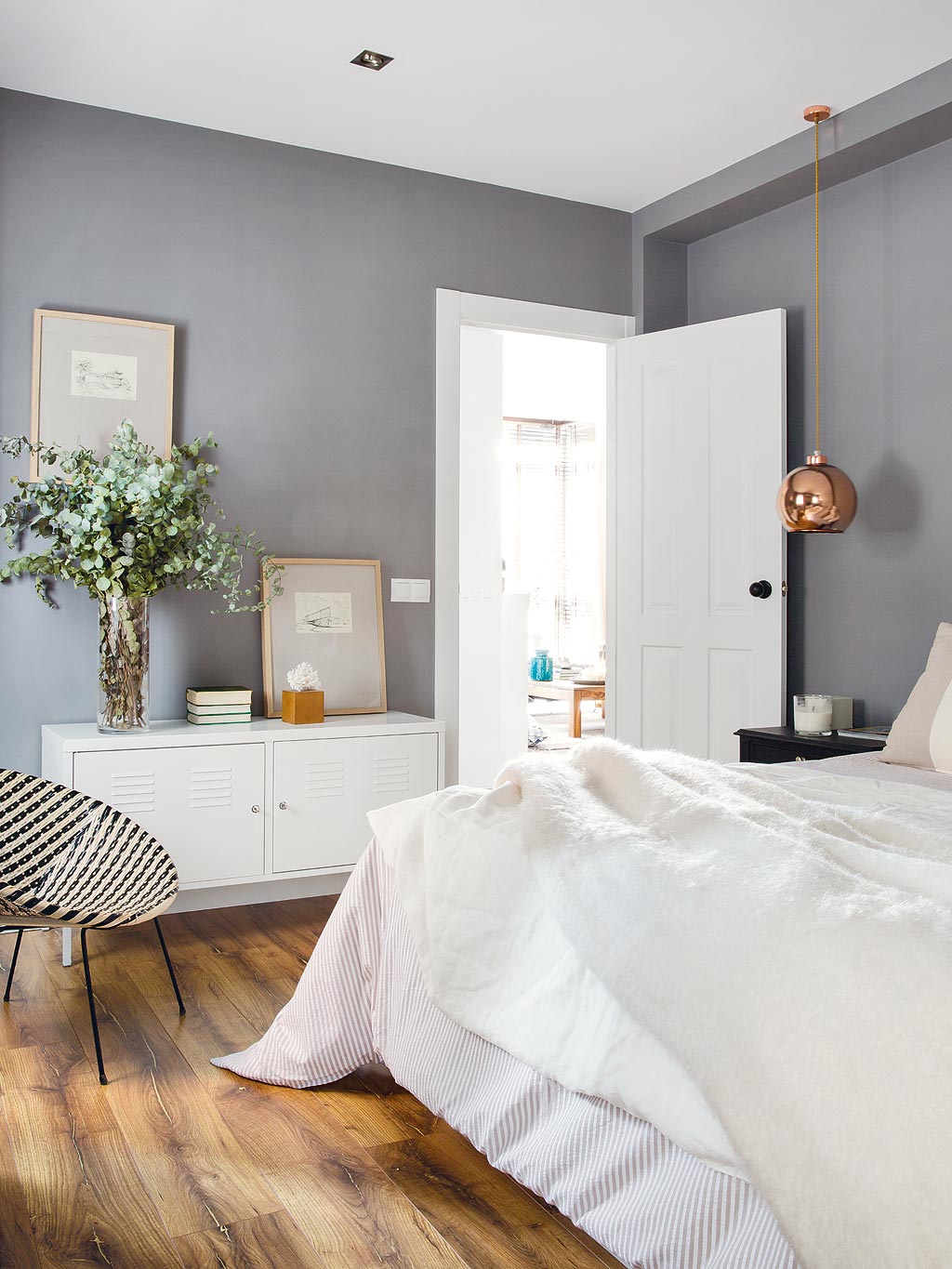 grey bedroom with white bedding