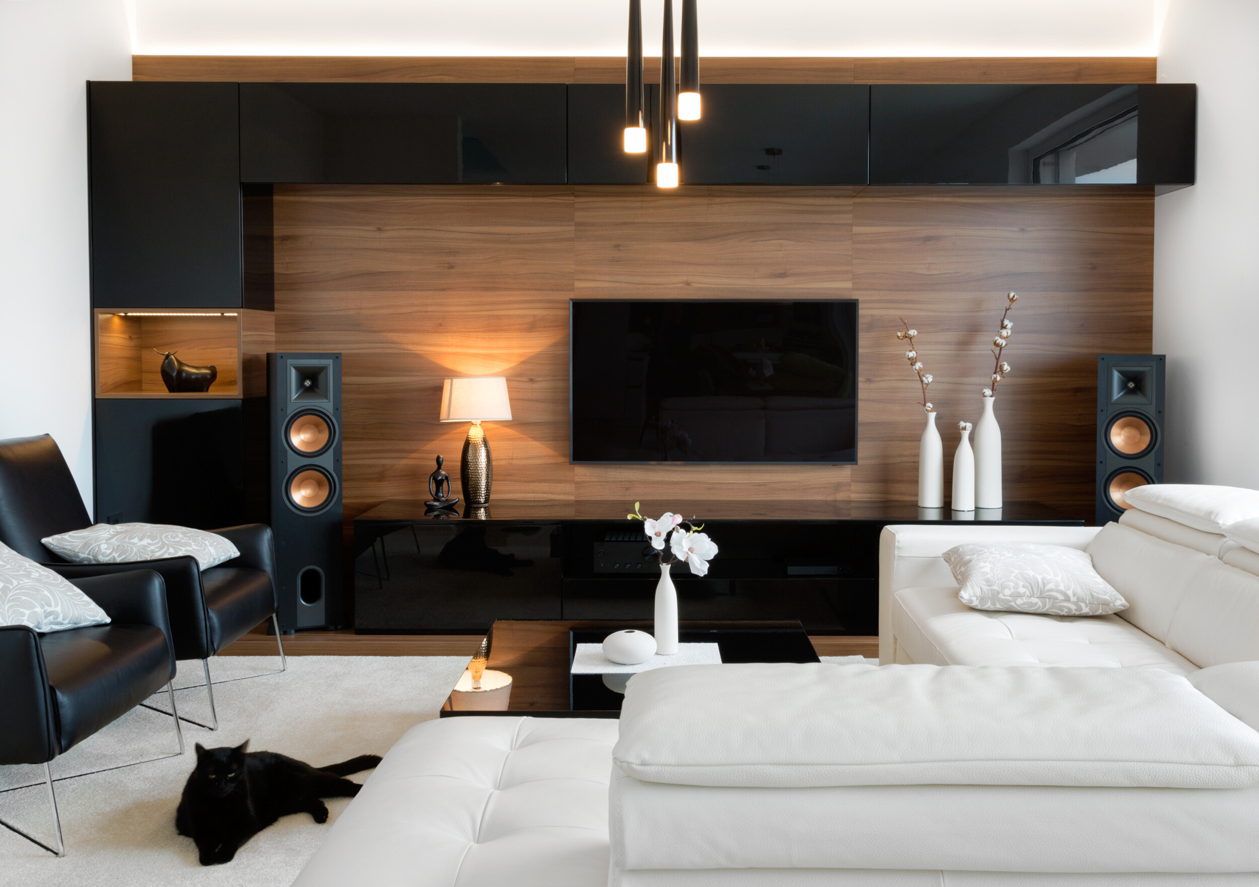 Modern living room with stereo speakers