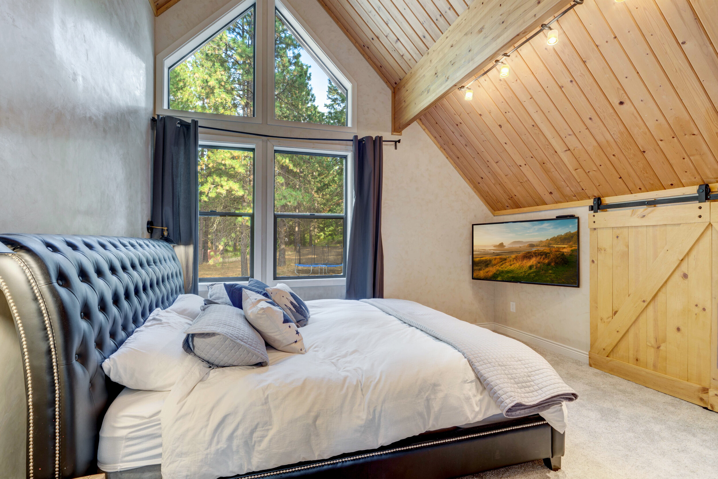 modern vaulted ceiling bedroom