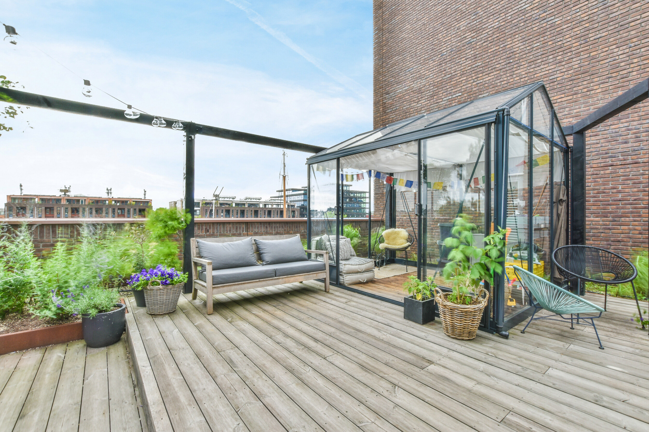 outdoor deck with greenhouse