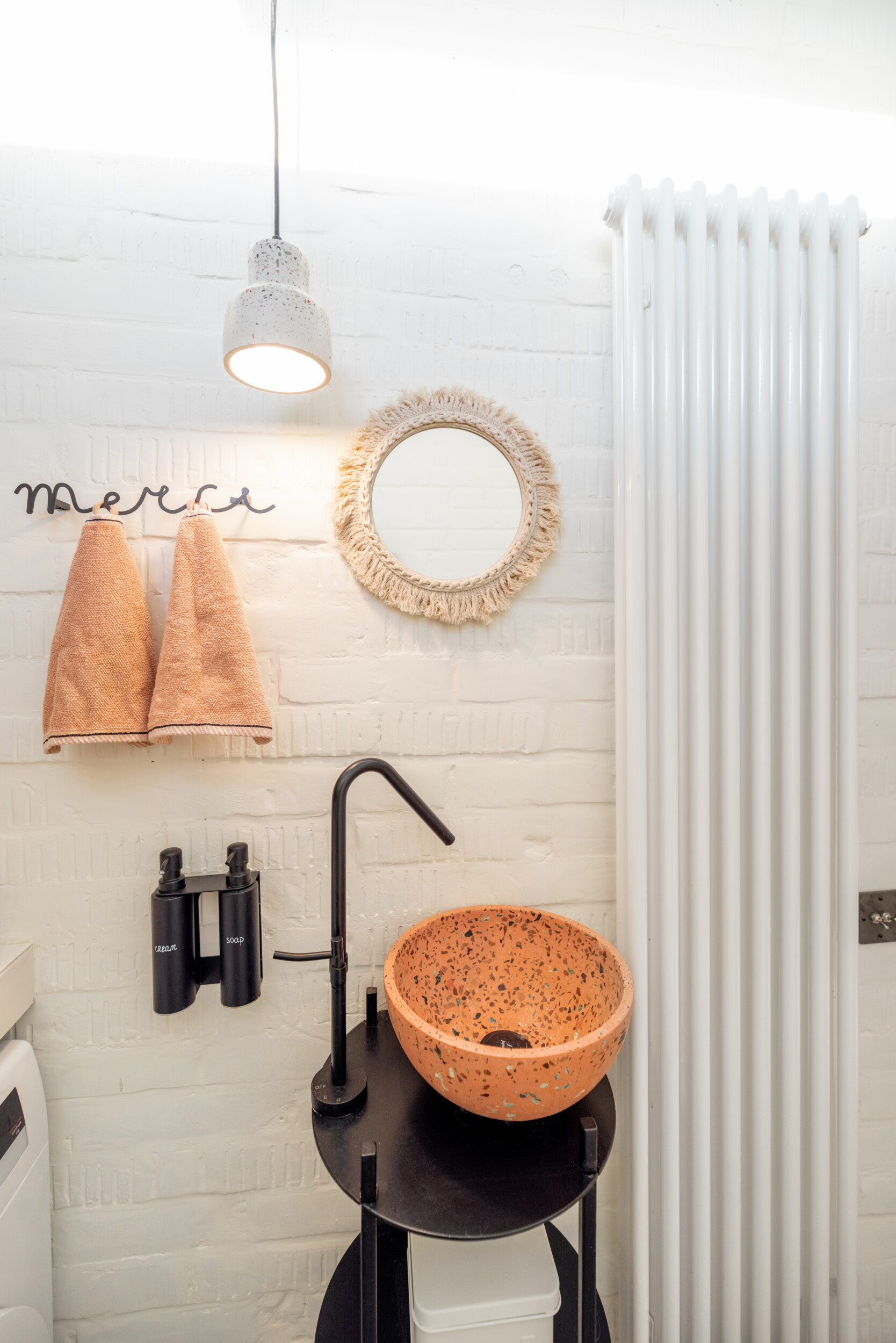 toilet interior with terrazo sink