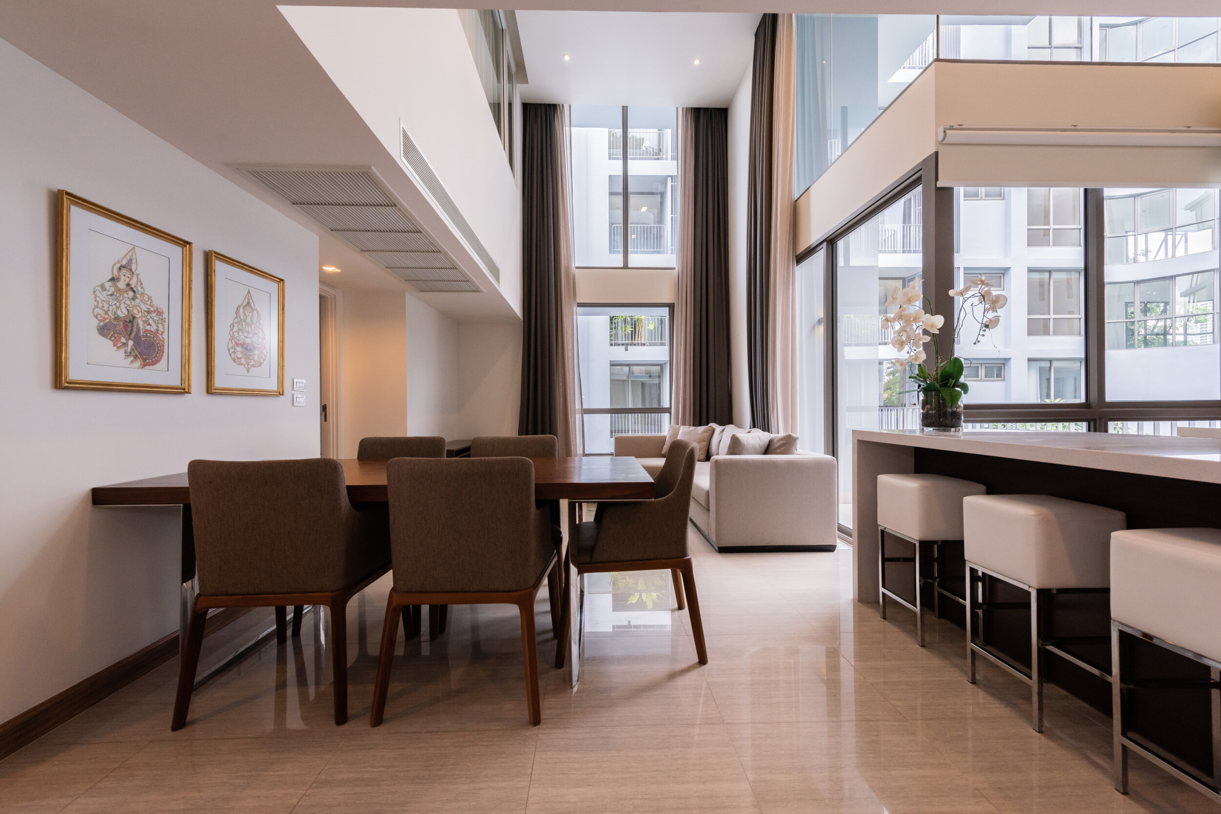 vaulted ceiling and large windows apartment