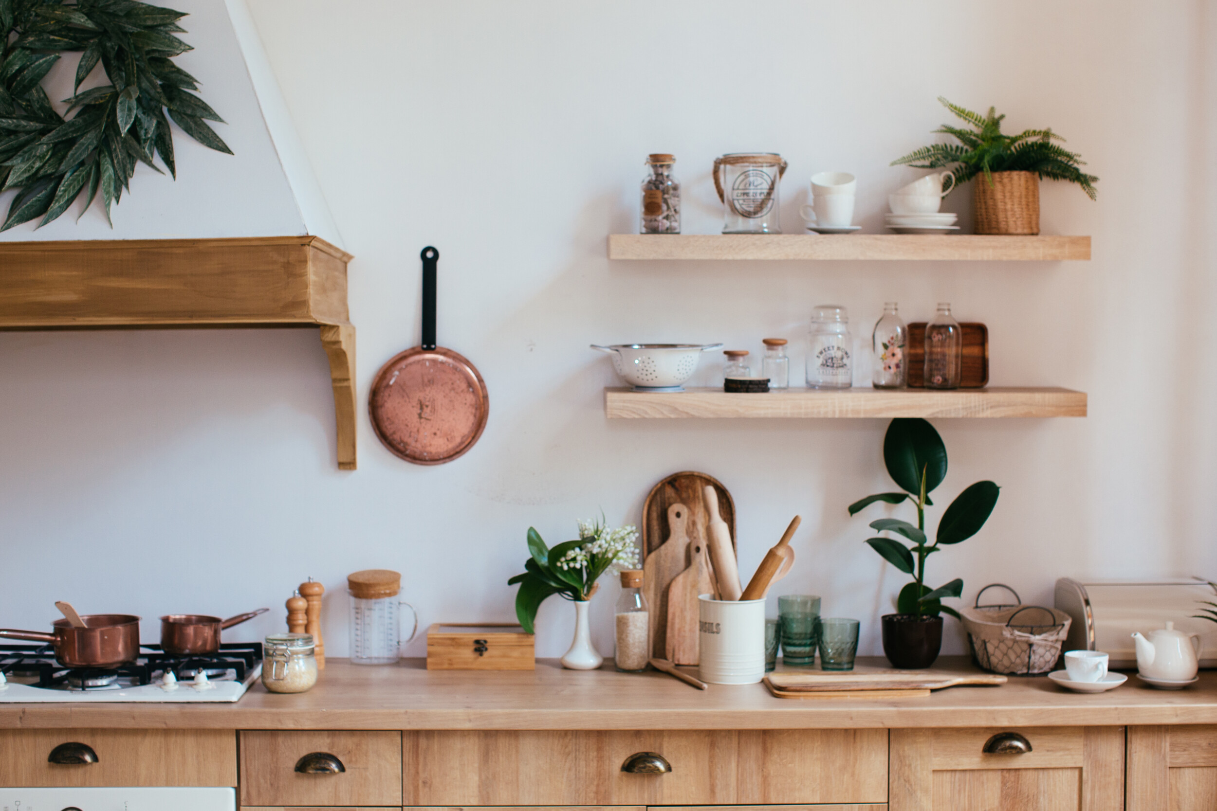 wooden rustic kitchen table. minimalistic interior, utencils on the table