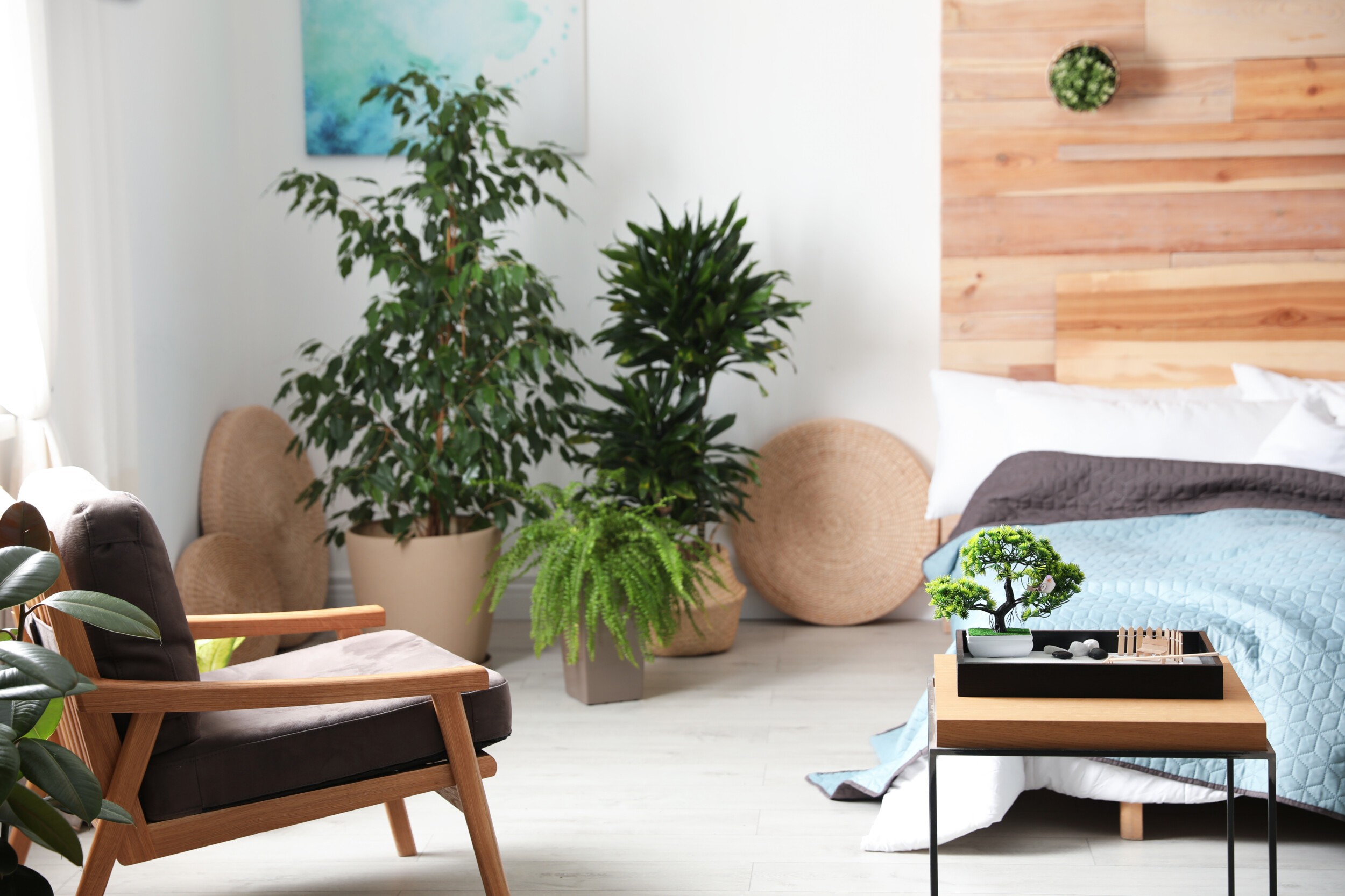 Miniature zen garden in stylish bedroom interior
