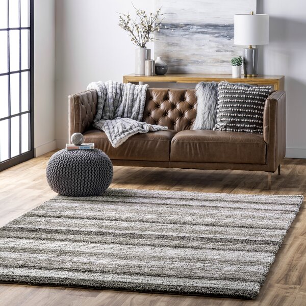 grey and white striped tufted rug