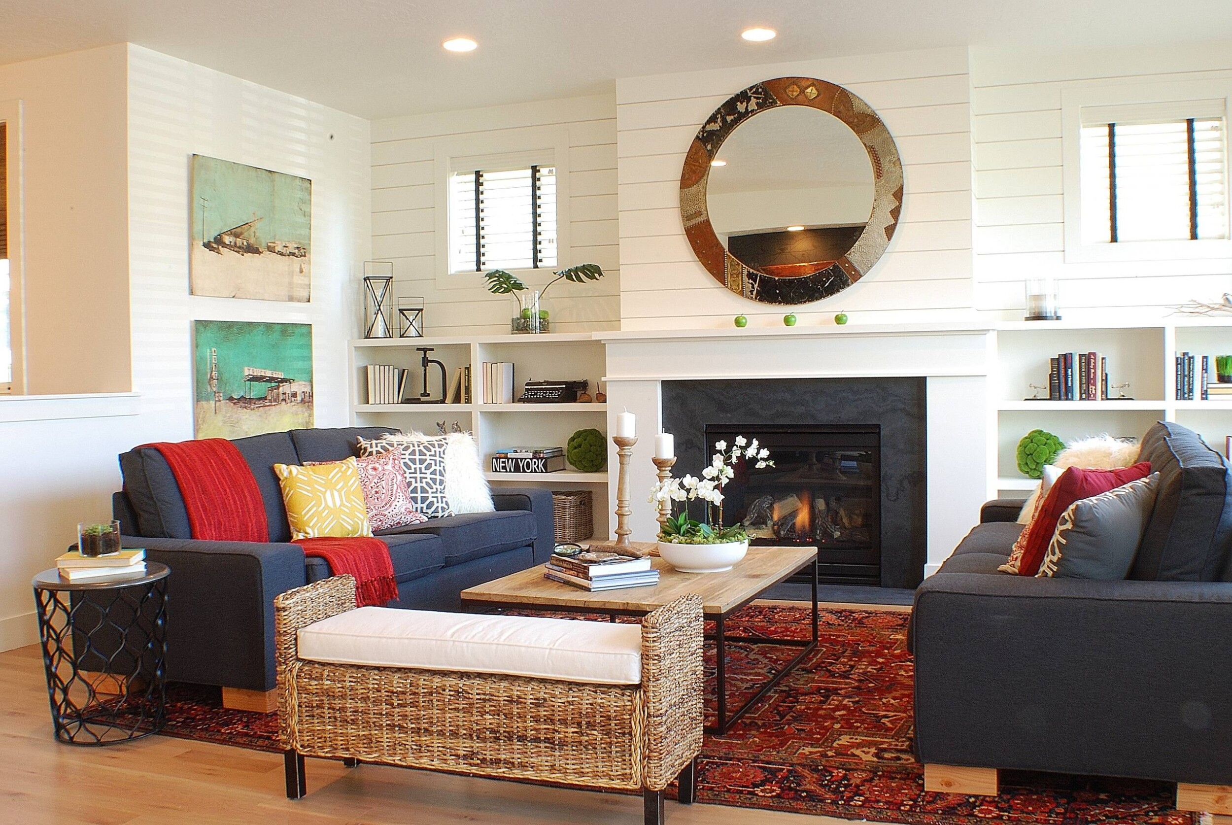 Modern boho living room with blue couches 