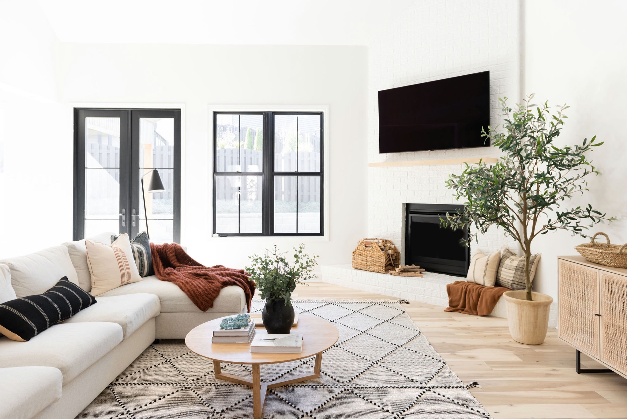 Modern farmhouse living room with white walls 