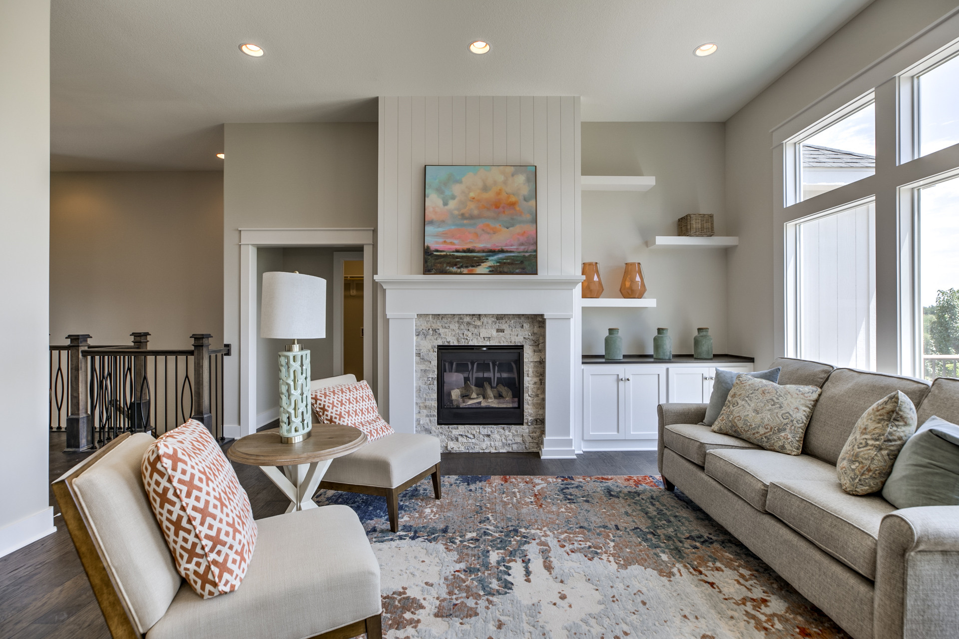 Modern living room with cool rug and fireplace 