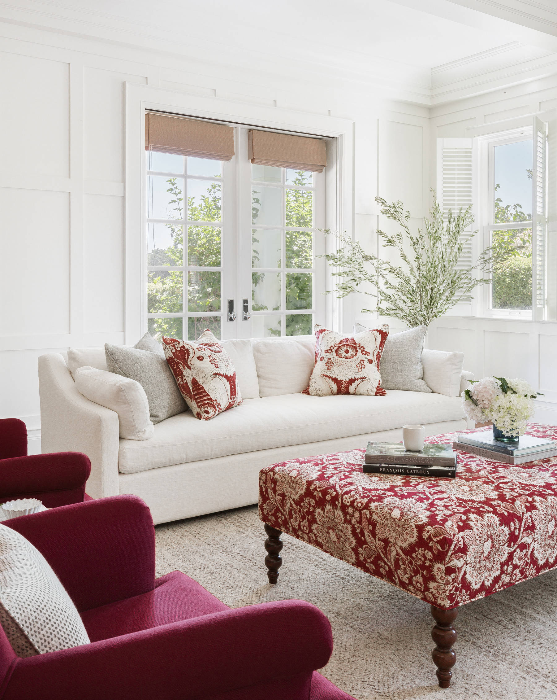 Modern living room with printed upholstered ottoman 