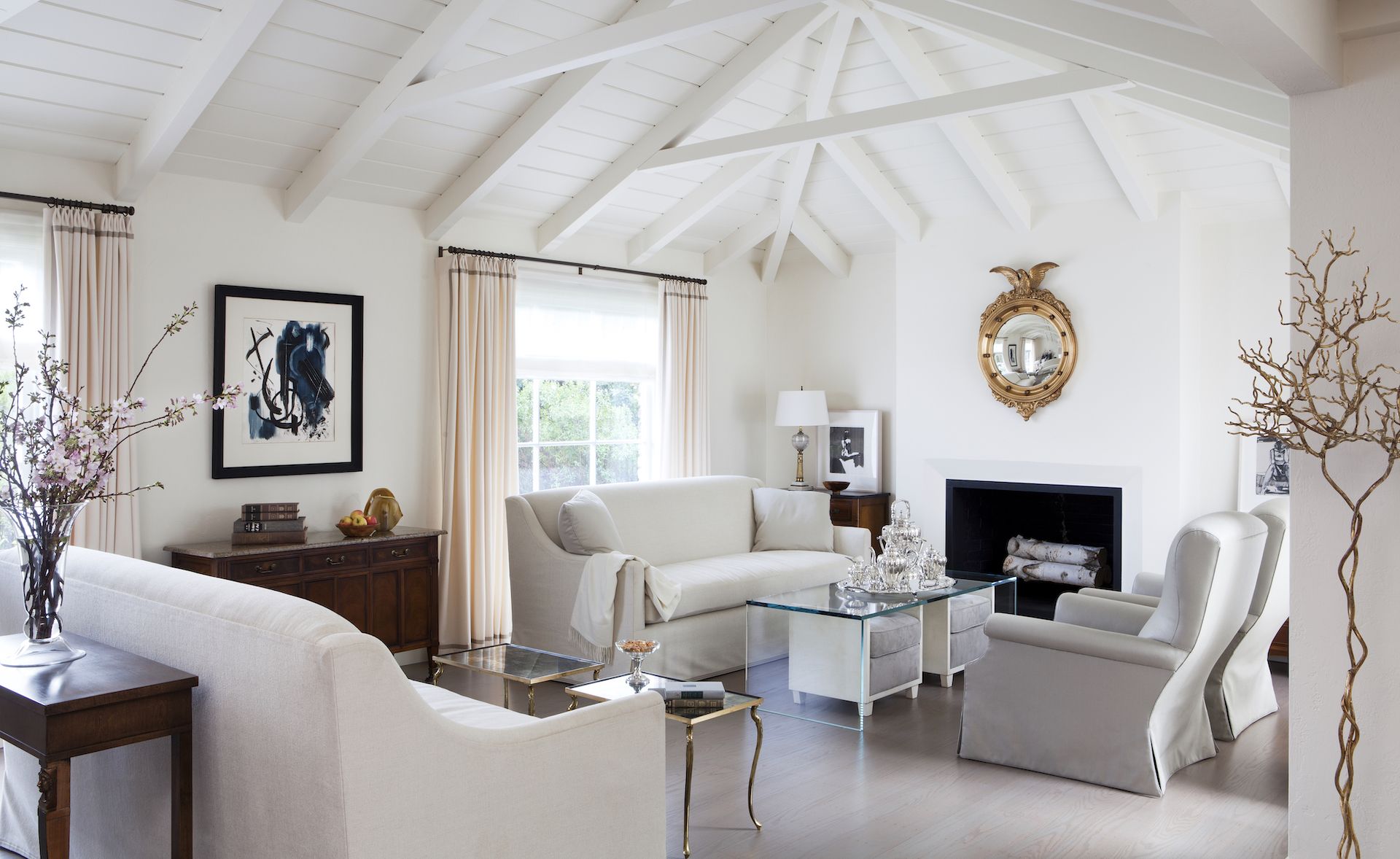 Modern living room with white vaulted ceiling 