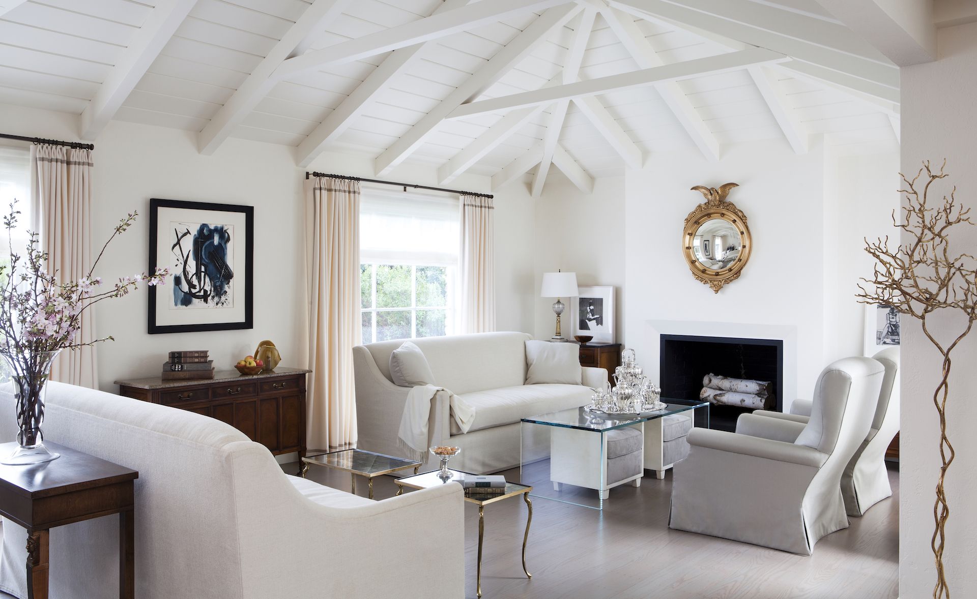 Modern living room with white vaulted ceiling